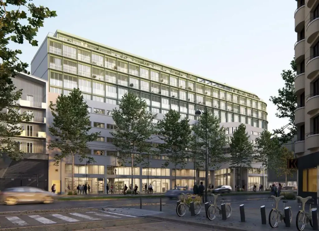 Vue extérieure du projet de surélévation R+9 d'un ancien parking automobile à Paris 14e.